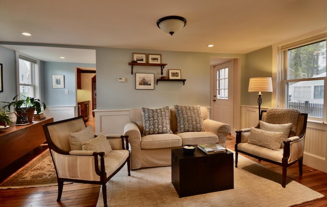 131 N St, Bath, ME 04530 - living area featuring hardwood / wood-style floors, a wainscoted wall, a decorative wall, and recessed lighting