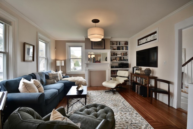 131 N St, Bath, ME 04530 - living area featuring built in features, crown molding, stairway, and dark wood-style floors