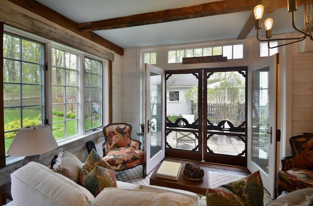 131 N St, Bath, ME 04530 - sunroom / solarium with beam ceiling, french doors, a chandelier, and wooden walls