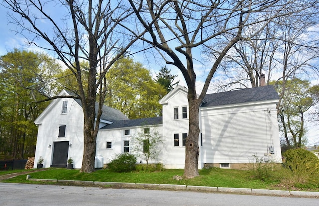 131 N St, Bath, ME 04530 - view of front of house featuring a chimney and a front lawn
