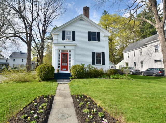 131 N St, Bath, ME 04530 - greek revival inspired property with a chimney and a front yard