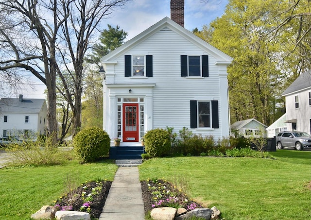 131 N St, Bath, ME 04530 - greek revival inspired property featuring a chimney and a front yard