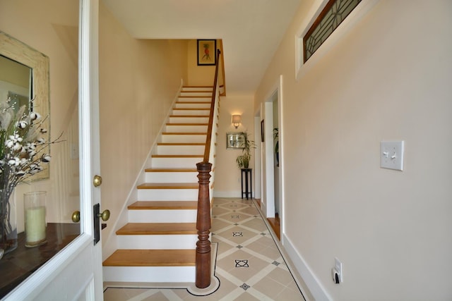 131 N St, Bath, ME 04530 - staircase with tile patterned floors and inlaid floor details