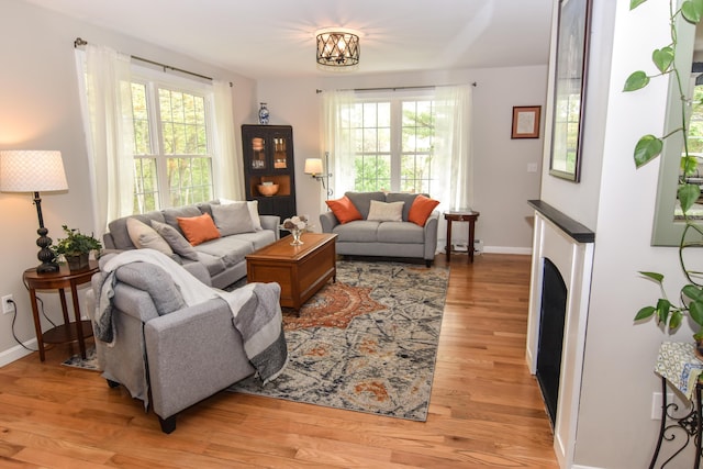 428 E Main St, Yarmouth, ME 04096 - living room featuring light wood finished floors and baseboards
