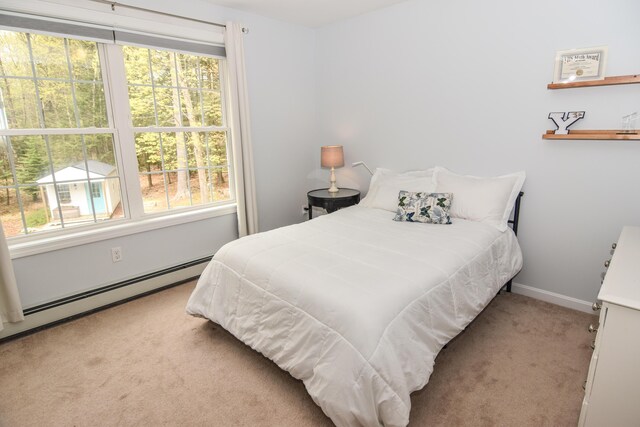 428 E Main St, Yarmouth, ME 04096 - carpeted bedroom with a baseboard radiator and baseboards