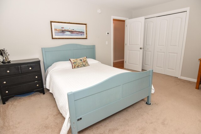 428 E Main St, Yarmouth, ME 04096 - carpeted bedroom featuring a closet and baseboards