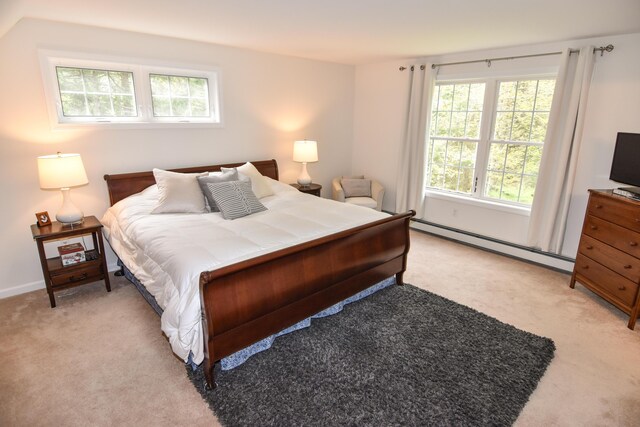 428 E Main St, Yarmouth, ME 04096 - bedroom featuring a baseboard radiator and light colored carpet