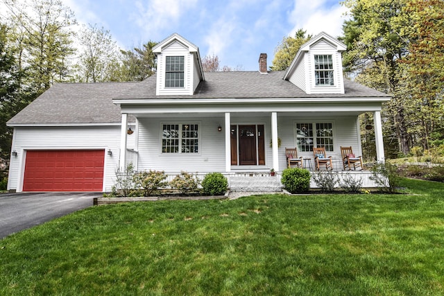 428 E Main St, Yarmouth, ME 04096 - cape cod-style house featuring a chimney, a porch, driveway, a front lawn, and a garage