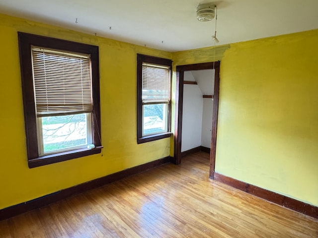 1575 Main St, Mapleton, ME 04757 - unfurnished bedroom with light wood-style floors and baseboards