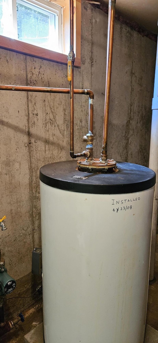 645 Kennebec St, Rumford, ME 04276 - utility room featuring water heater