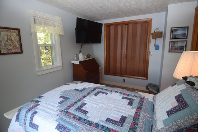 bedroom with a textured ceiling
