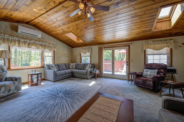 9 Ridge Rd, Westbrook, ME 04092 - carpeted living area featuring wood ceiling, a skylight, plenty of natural light, vaulted ceiling, and a wall mounted AC