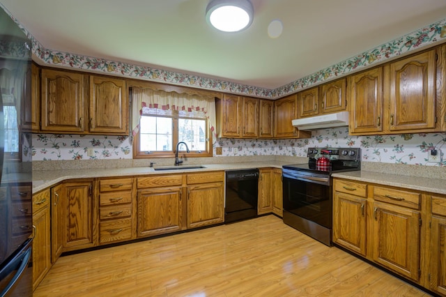 9 Ridge Rd, Westbrook, ME 04092 - kitchen featuring dishwasher, electric stove, under cabinet range hood, a sink, and brown cabinetry