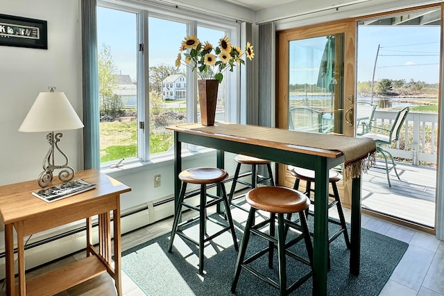 dining room with a water view