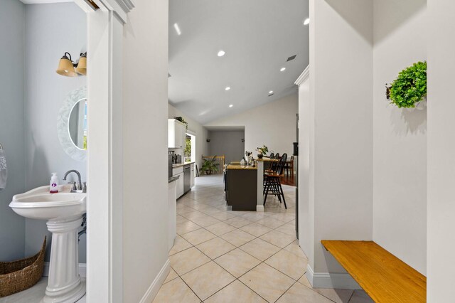 29 Gabriels Way, Turner, ME 04282 - hall with light tile patterned floors, recessed lighting, vaulted ceiling, and baseboards