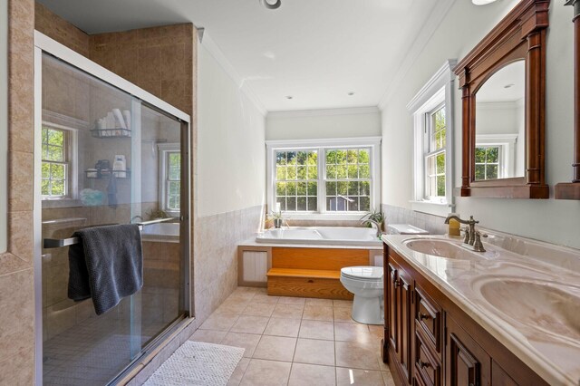 29 Gabriels Way, Turner, ME 04282 - full bathroom featuring tile patterned floors, healthy amount of natural light, tile walls, double vanity, and ornamental molding
