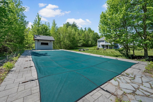 29 Gabriels Way, Turner, ME 04282 - view of swimming pool with a covered pool, an outdoor structure, and a yard
