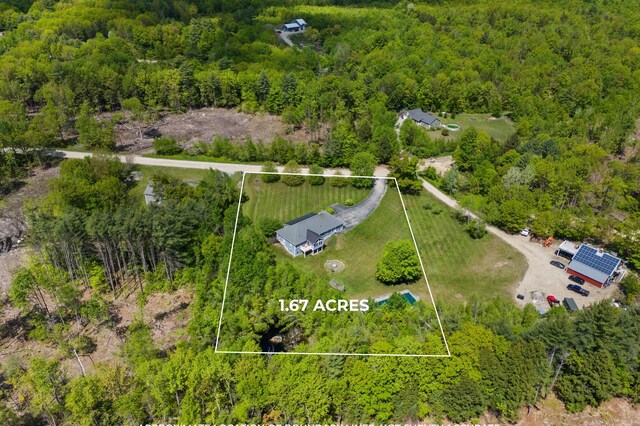 29 Gabriels Way, Turner, ME 04282 - aerial overview of property's location with property parcel outlined and a heavily wooded area