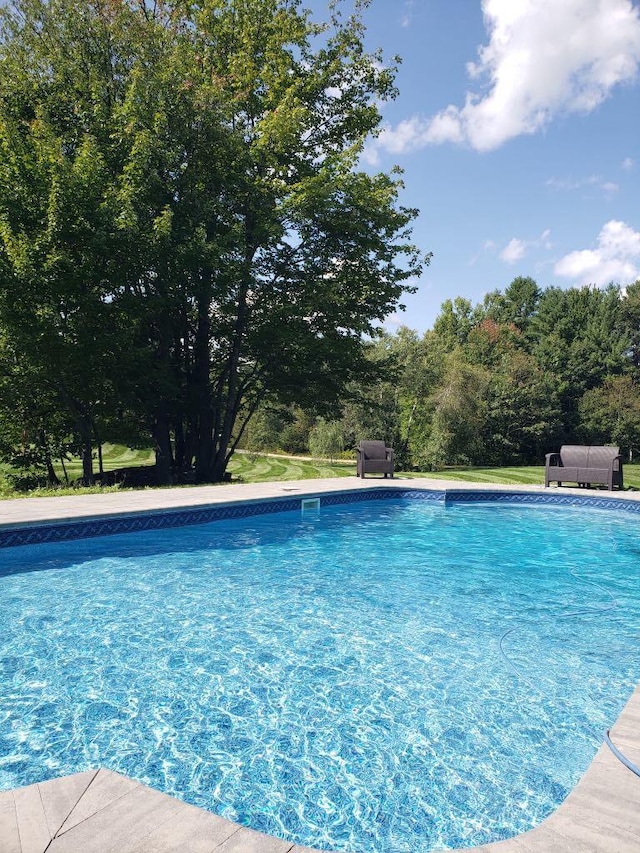 29 Gabriels Way, Turner, ME 04282 - swimming pool featuring an outdoor living space