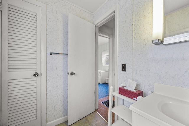 16 Columbia Ave, Tremont, ME 04612 - bathroom featuring vanity and ornamental molding