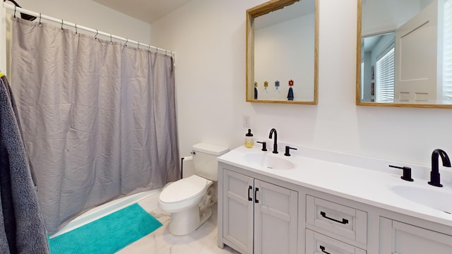 full bath with toilet, double vanity, and curtained shower