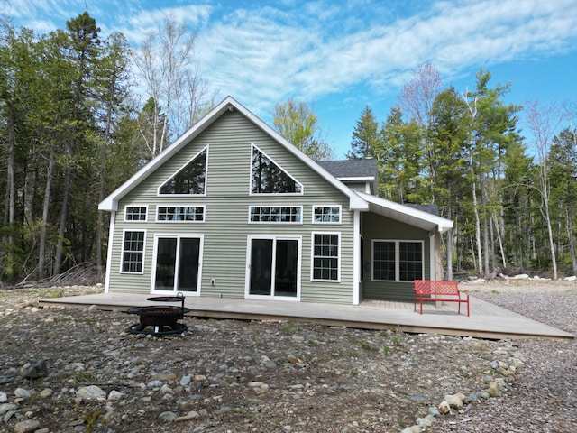 rear view of property with a deck
