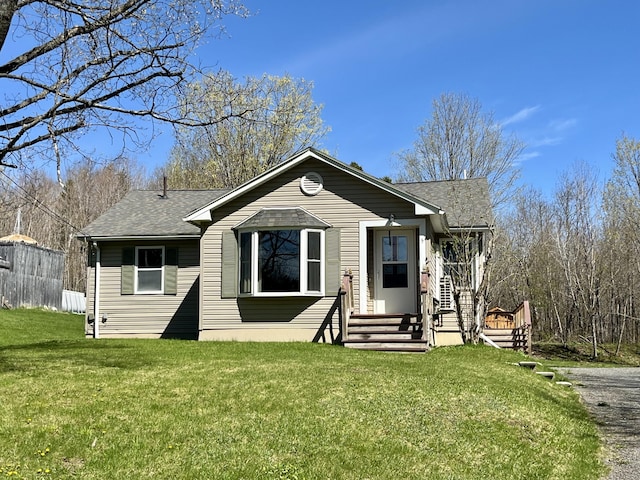 5 Mayo St, Caribou, ME 04736 - view of front of home with roof with shingles and a front lawn