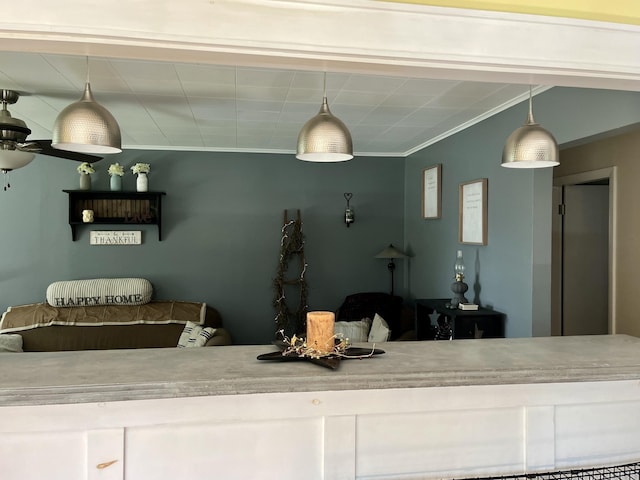 5 Mayo St, Caribou, ME 04736 - interior space featuring decorative light fixtures, ornamental molding, and white cabinetry