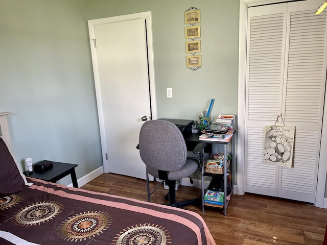 5 Mayo St, Caribou, ME 04736 - bedroom with wood finished floors, an office area, a closet, and baseboards