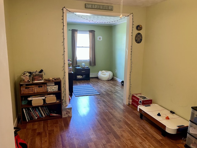 5 Mayo St, Caribou, ME 04736 - bathroom with wood finished floors, a baseboard heating unit, and baseboards