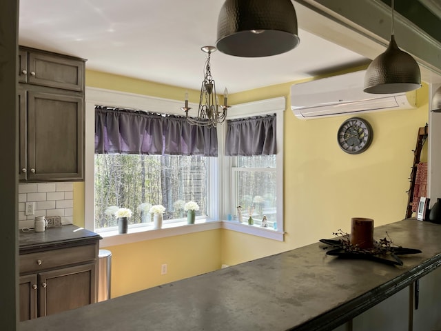 5 Mayo St, Caribou, ME 04736 - dining space with a wall mounted AC and a chandelier