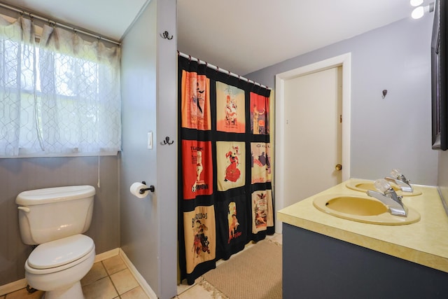 555 Meadow Rd, Topsham, ME 04086 - full bathroom featuring toilet, tile patterned floors, vanity, and a shower with shower curtain