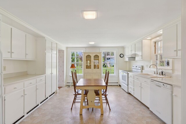 378 Pool St, Biddeford, ME 04005 - kitchen with white appliances, a sink, light countertops, and white cabinetry