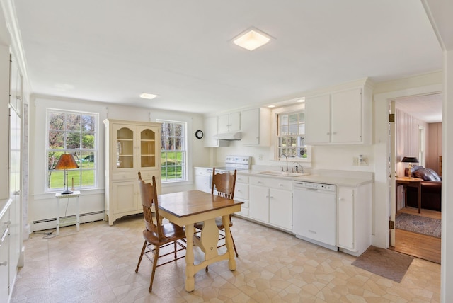 378 Pool St, Biddeford, ME 04005 - kitchen with white appliances, a baseboard radiator, a sink, light countertops, and under cabinet range hood