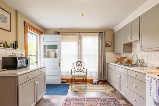 127 Harbor Rd, Friendship, ME 04547 - kitchen featuring a sink, black microwave, light countertops, and range