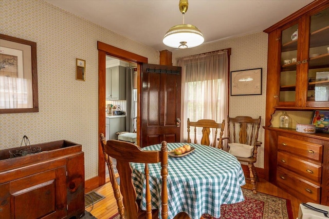 127 Harbor Rd, Friendship, ME 04547 - dining space featuring wallpapered walls and light wood-type flooring
