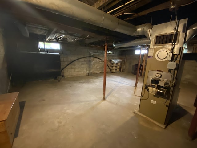 basement featuring oil tank
