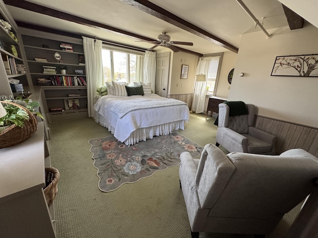 969 Washington St, Bath, ME 04530 - carpeted bedroom featuring beam ceiling, wainscoting, and a ceiling fan