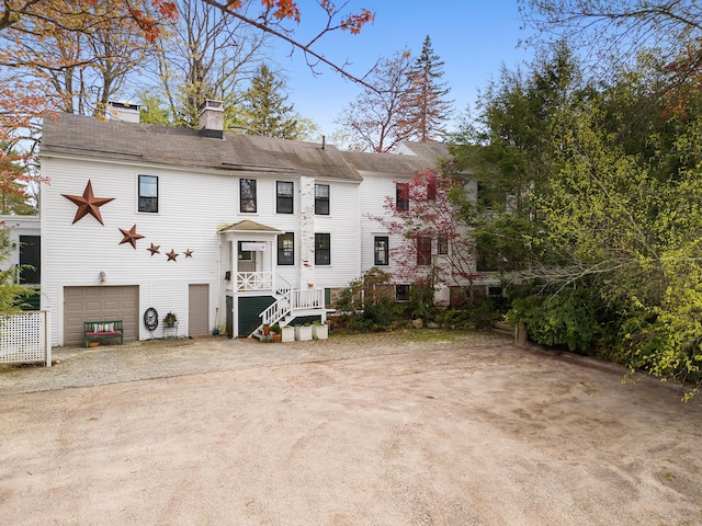 969 Washington St, Bath, ME 04530 - view of front of home featuring an attached garage, a chimney, and driveway