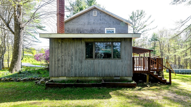 770 Poland Spring Rd, Casco, ME 04015 - view of side of property with a deck, stairs, a chimney, a lawn, and crawl space