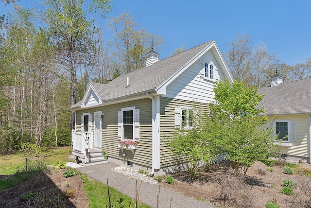 272 Mills Rd Unit 17, Kennebunkport, ME 04046 - view of front of home featuring a chimney and a shingled roof