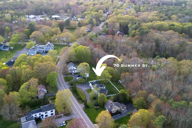70 Summer St, Kennebunk, ME 04043 - aerial view of property and surrounding area with a heavily wooded area