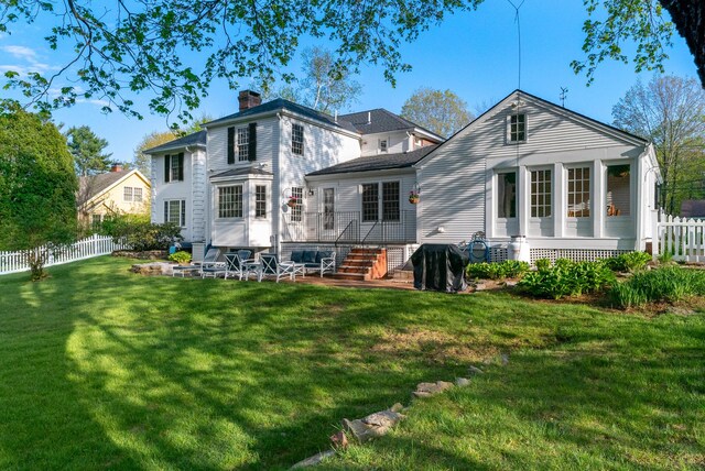 70 Summer St, Kennebunk, ME 04043 - back of property featuring a chimney and a patio area