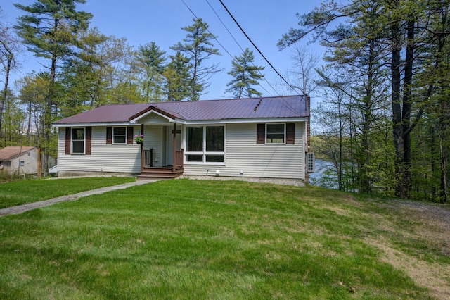 347 Brownfield Rd, Porter, ME 04068 - ranch-style house with a front lawn and metal roof