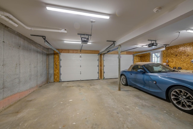 347 Brownfield Rd, Porter, ME 04068 - garage featuring a garage door opener