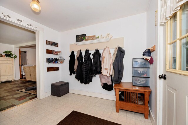 22 Pleasant St, Phillips, ME 04966 - mudroom featuring tile patterned floors and baseboards