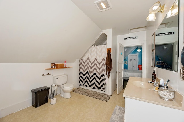 22 Pleasant St, Phillips, ME 04966 - bathroom with toilet, vanity, lofted ceiling, tile patterned floors, and a shower with shower curtain