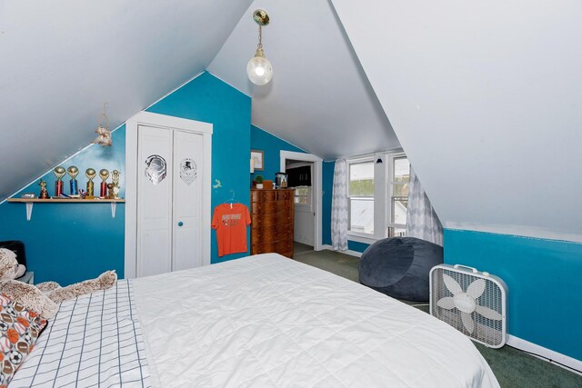 22 Pleasant St, Phillips, ME 04966 - bedroom featuring carpet, lofted ceiling, a closet, and baseboards