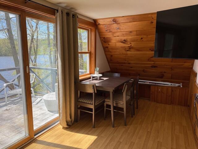 102 Hills Pt, Union, ME 04862 - dining space featuring light wood-type flooring and lofted ceiling