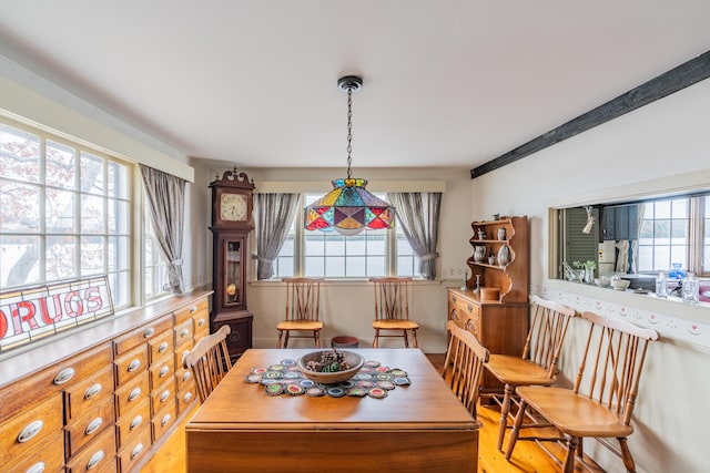 dining space with light wood-style floors